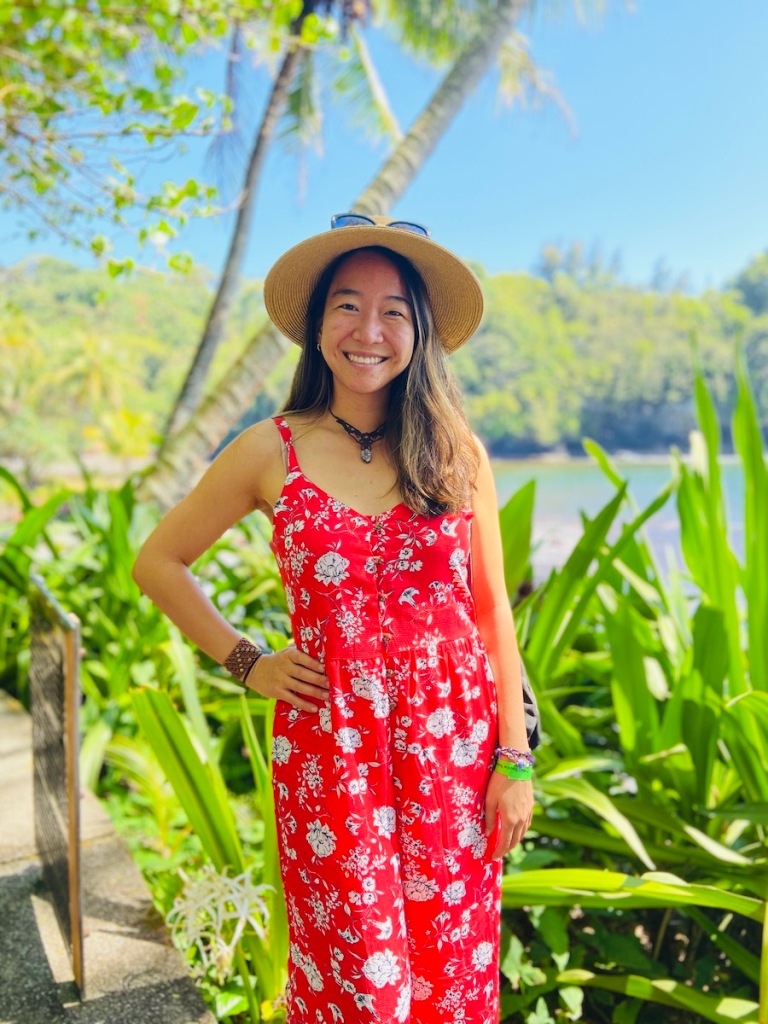 Woman on coast along Hawaii Botanical Garden